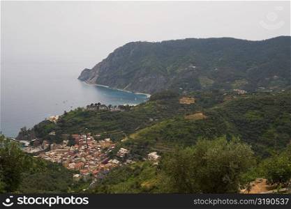 High angle view of a town at the sea side, Ligurian Sea, Italian Riviera, Monterosso al Mare, Cinque Terre, La Spezia, Liguria, Italy