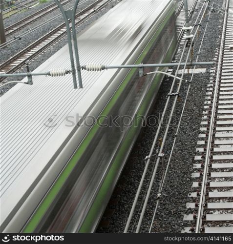 High angle view of a train running on track, Tokyo, Japan