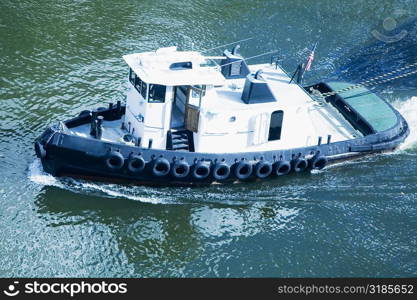 High angle view of a tugboat in the sea