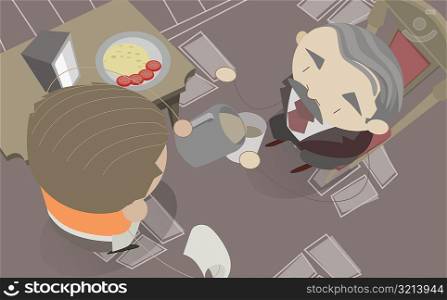 High angle view of a waiter serving food to a man