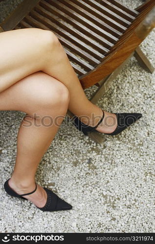 High angle view of a woman wearing high heel shoes