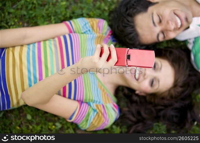 High angle view of a young couple smiling together