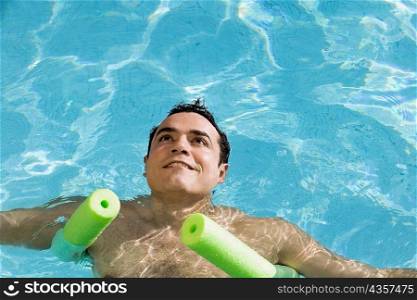 High angle view of a young man in a swimming pool