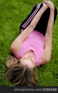 High angle view of a young woman exercising