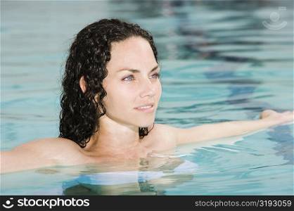 High angle view of a young woman in a swimming pool