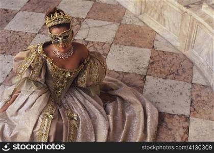 High angle view of a young woman in traditional clothing, Venice, Veneto, Italy