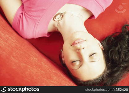 High angle view of a young woman sleeping