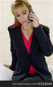High angle view of a young woman talking on a mobile phone