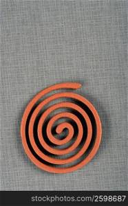 High angle view of an insect repellant coil