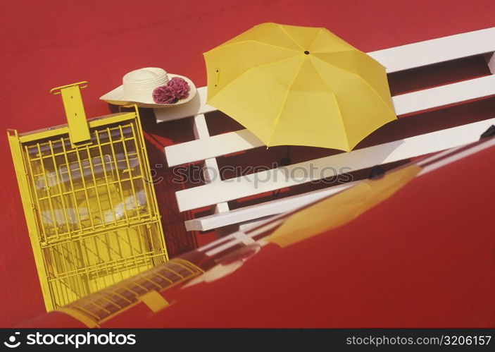 High angle view of an umbrella on a bench