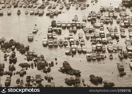 High angle view of boats moored at a harbor, Hong Kong, China
