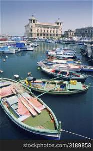 High angle view of boats moored at a harbor, Siracusa, Sicily, Italy