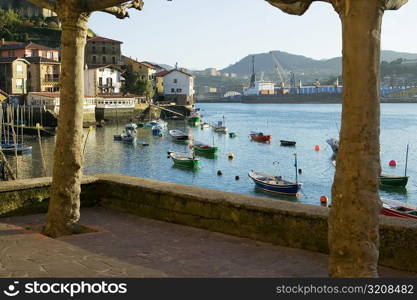 High angle view of boats moored docked at a harbor, Spain