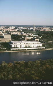 High angle view of buildings beside a river, John F. Kennedy Center, Washington DC, USA