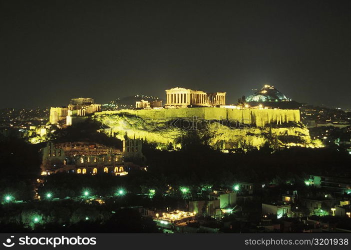 High angle view of buildings in a city lit up at night, Parthenon, Athens, Greece