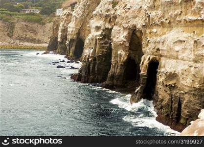 High angle view of caves under a cliff, La Jolla Reefs, San Diego Bay, California, USA