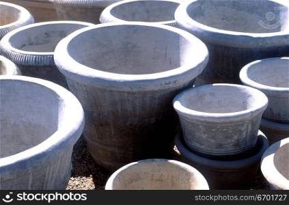 High angle view of cement flower pots