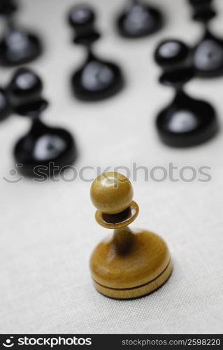 High angle view of chess pawns