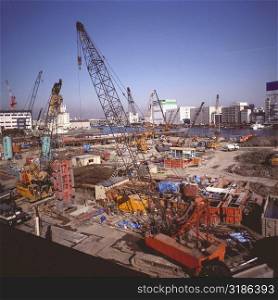 High angle view of cranes at a construction site, Tokyo Prefecture, Japan