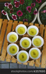 High angle view of cups of green tea on a tray, Hakone, Kanagawa Prefecture, Honshu, Japan