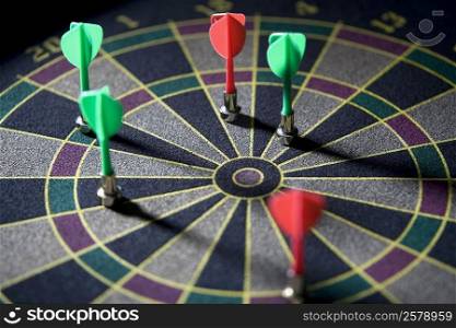 High angle view of darts on a dartboard