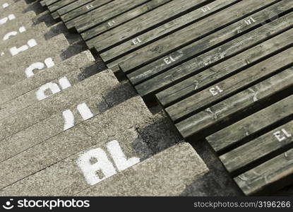 High angle view of empty bleacher seats in a stadium