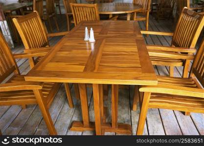 High angle view of empty chairs and tables in a restaurant