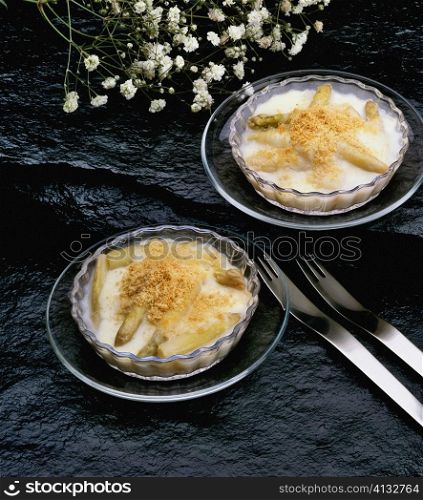 High angle view of esparragos gratin on bowls