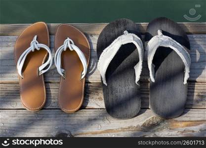 High angle view of flip-flops on a jetty