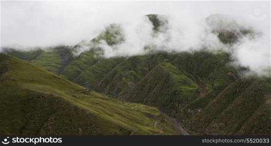 High angle view of foggy mountains, Gonggar, Shannan, Tibet, China