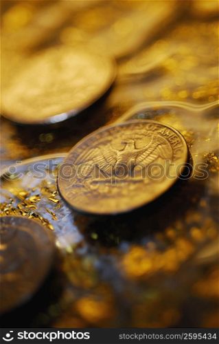 High angle view of heaps of coins