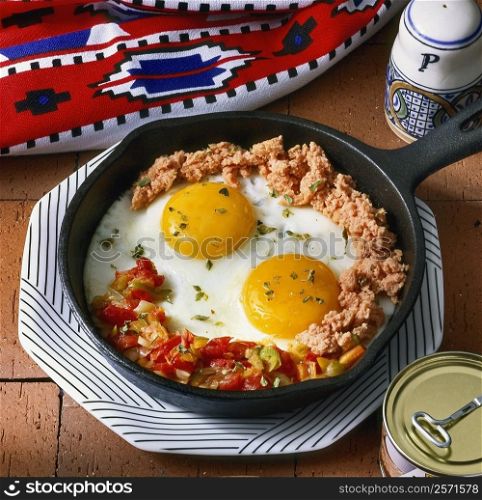 High angle view of huevos fritos in a frying pan