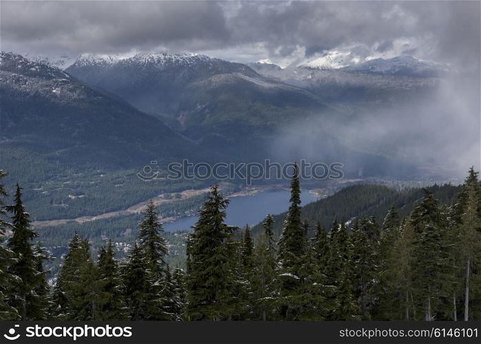 High angle view of lake with mountains in winter, Whistler, British Columbia, Canada
