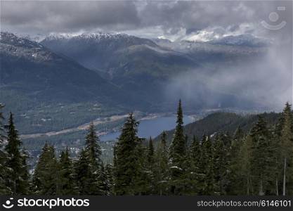 High angle view of lake with mountains in winter, Whistler, British Columbia, Canada