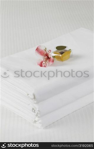 High angle view of linen sheets on the bed
