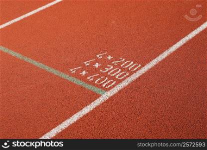 High angle view of numbers painted on a running track