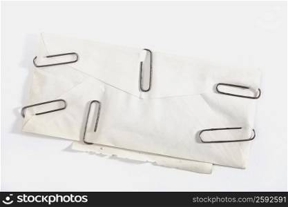 High angle view of paper clips on an envelope