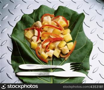 High angle view of pollo hawaiano on a leaf