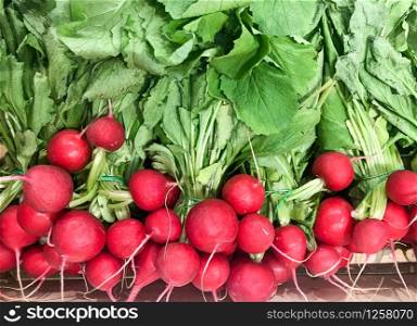 High Angle View Of Radish For Sale. Healthy Fresh Food Background.