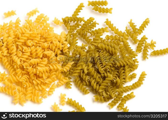 High angle view of raw fusilli pasta