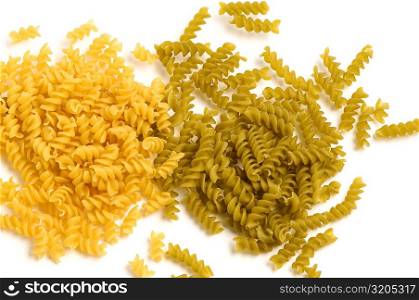 High angle view of raw fusilli pasta