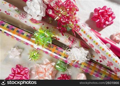 High angle view of ribbons and wrapping paper