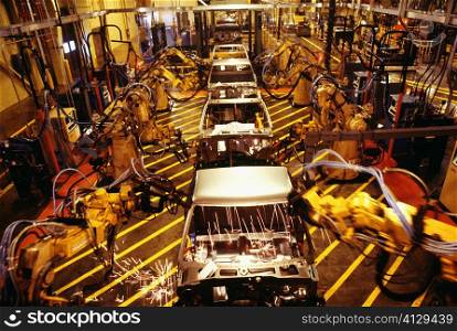 High angle view of robots at work in a plant, GMC Truck Plant, Michigan, USA