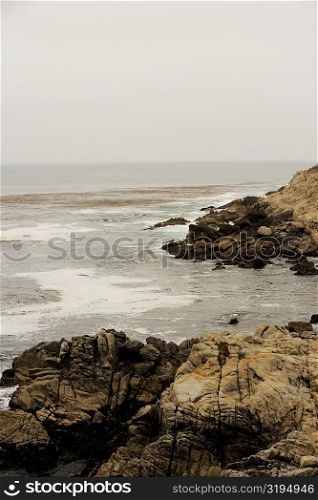 High angle view of rocks in the Pacific Ocean, California, USA