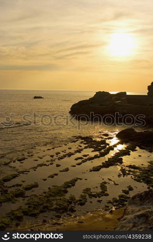 High angle view of rocks in the sea at dusk, Biarritz, Basque Country, Pyrenees-Atlantiques, Aquitaine, France