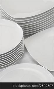 High angle view of stack of plates