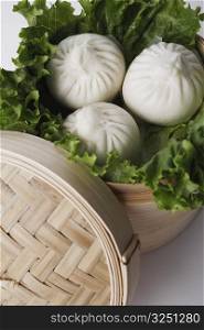 High angle view of steamed dumplings in a steamer