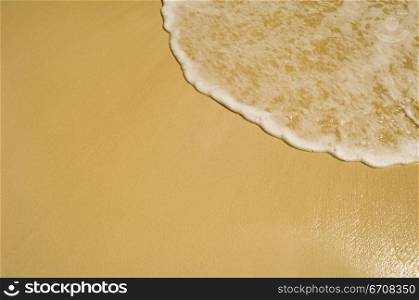 High angle view of surf on the beach