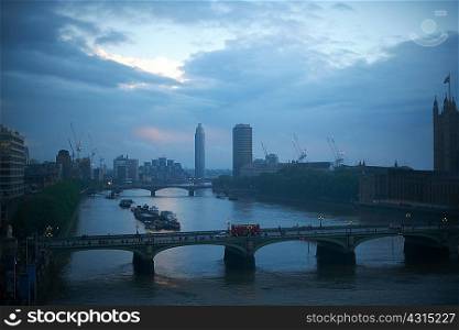 High angle view of the Thames and Westminster bridge at dawn, London, England, UK