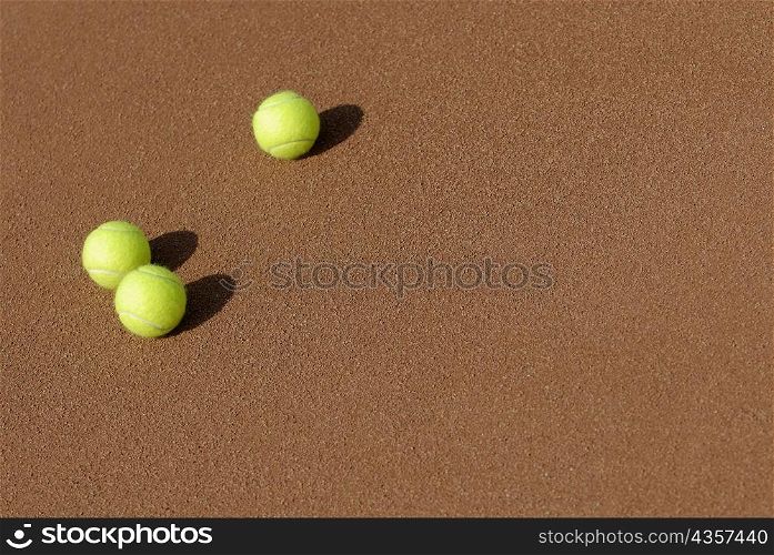 High angle view of three tennis balls